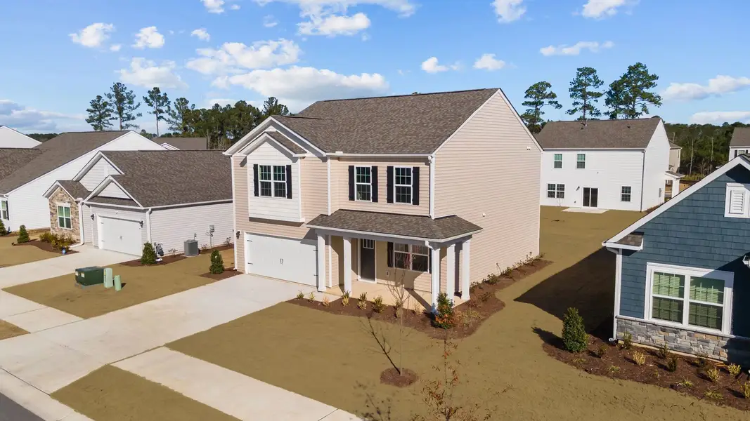 Front exterior of a new home in West New Bern, New Bern, NC, highlighting curb appeal (Image 2).