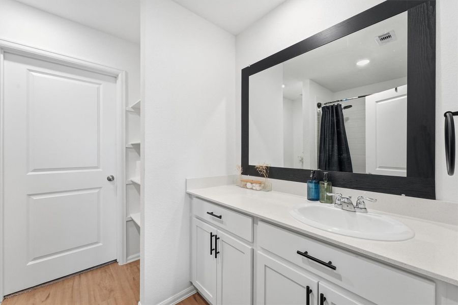Furnished interior view inside a new home in Pinewood at Grand Texas, New Caney (Image 9).