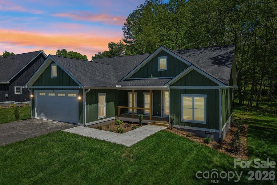 Front exterior of a new home in , Hendersonville, NC, highlighting curb appeal (Image 22).