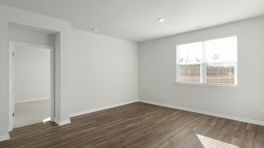 Spacious, unfurnished interior of a new home in The Grove at Blake Farm, Wilmington (Image 12).