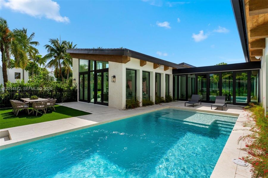 Exterior details and patio area of a home in , Coral Gables (Image 16). Exterior details and patio area of a home in , Coral Gables (Image 16).