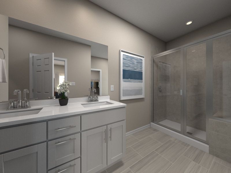The beautiful primary bathroom offers dual sinks and walk-in shower. The beautiful primary bathroom offers dual sinks and walk-in shower.