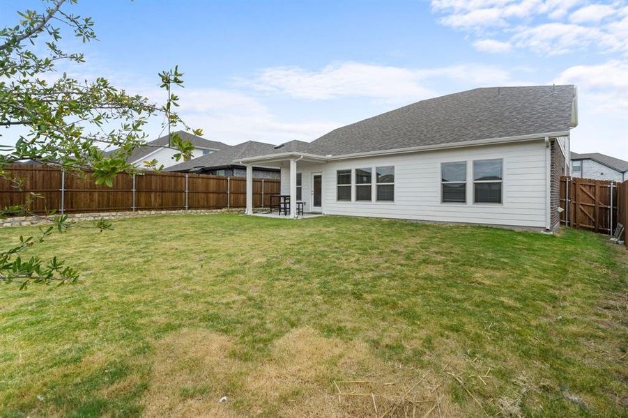 Front exterior of a new home in Cibolo Hills, Fort Worth, TX, highlighting curb appeal (Image 23). Front exterior of a new home in Cibolo Hills, Fort Worth, TX, highlighting curb appeal (Image 23).