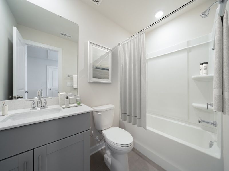 Secondary bathroom in the Roswell floorplan at a Meritage Homes community in Garner, NC.