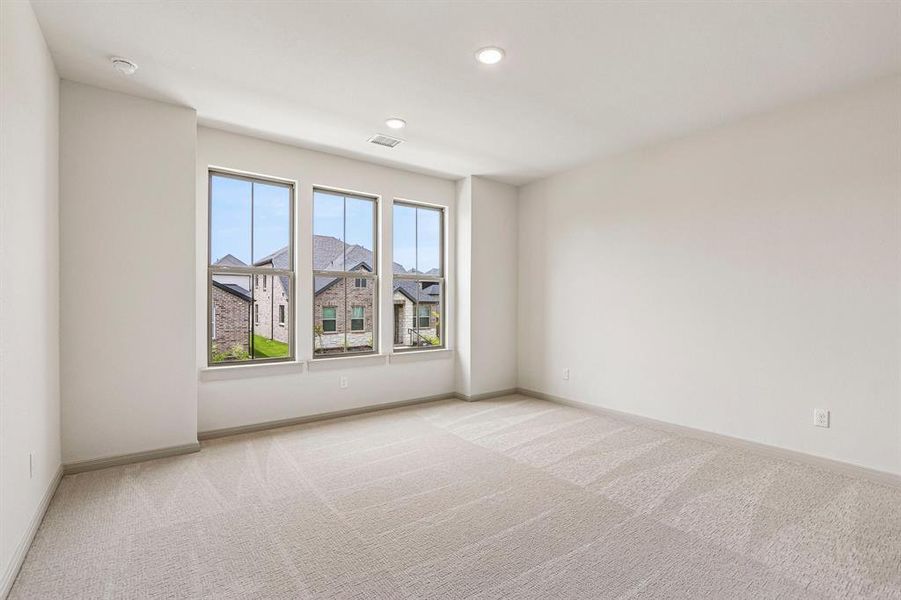 You'll find nicely sized secondary bedrooms in our Gaston plan.