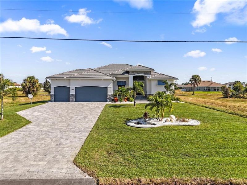 Front exterior of a new home in , Rotonda West, FL, highlighting curb appeal (Image 22).