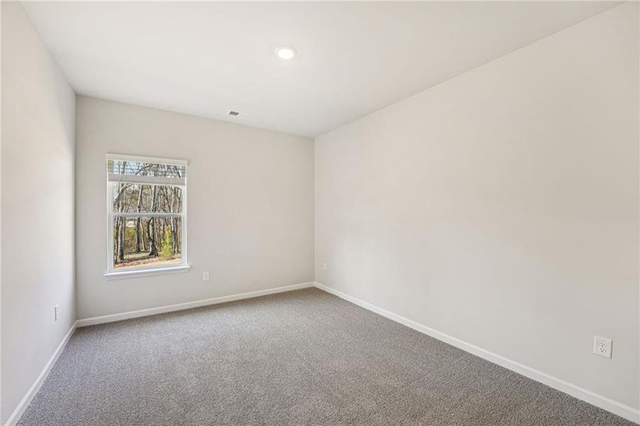 Spacious, unfurnished interior of a new home in Westmont Preserve, Powder Springs (Image 42).