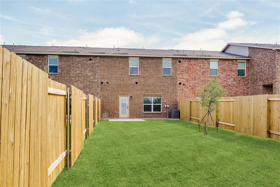 This is an example of the backyard at 443 MB's Way. All backyards are fenced, landscaped, and have a concrete patio. This is an example of the backyard at 443 MB's Way. All backyards are fenced, landscaped, and have a concrete patio.
