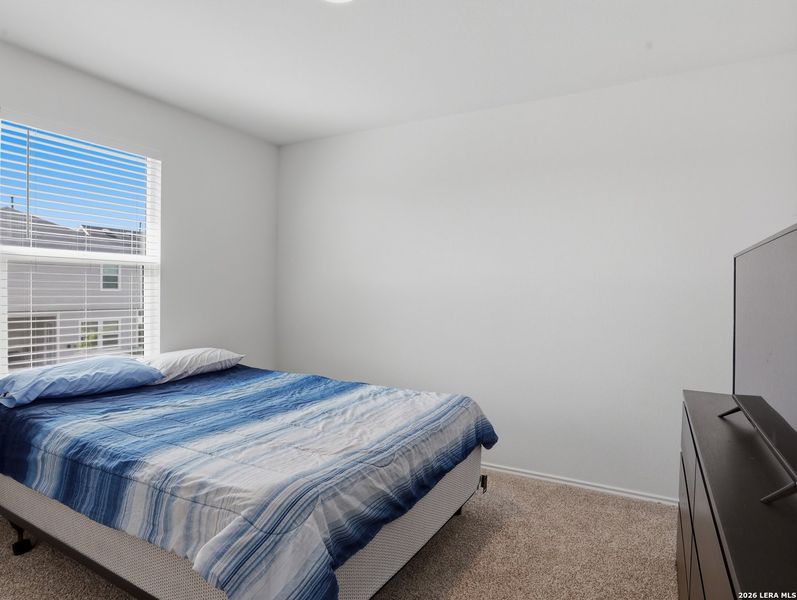 Furnished interior view inside a new home in Watermill, Uhland (Image 13).