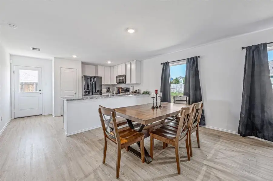 Furnished interior view inside a new home in South Oak Grove: Cottage Collection, Fort Worth (Image 4). Furnished interior view inside a new home in South Oak Grove: Cottage Collection, Fort Worth (Image 4).