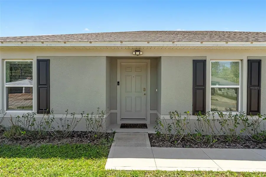 Exterior details and patio area of a home in , Palm Coast (Image 2). Exterior details and patio area of a home in , Palm Coast (Image 2).
