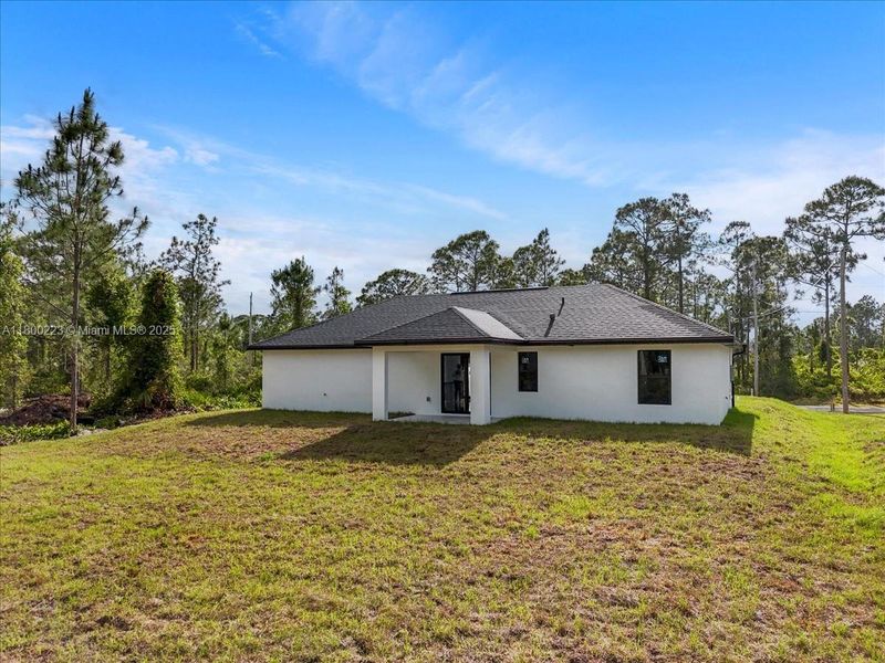 Exterior details and patio area of a home in , Lehigh Acres (Image 27). Exterior details and patio area of a home in , Lehigh Acres (Image 27).