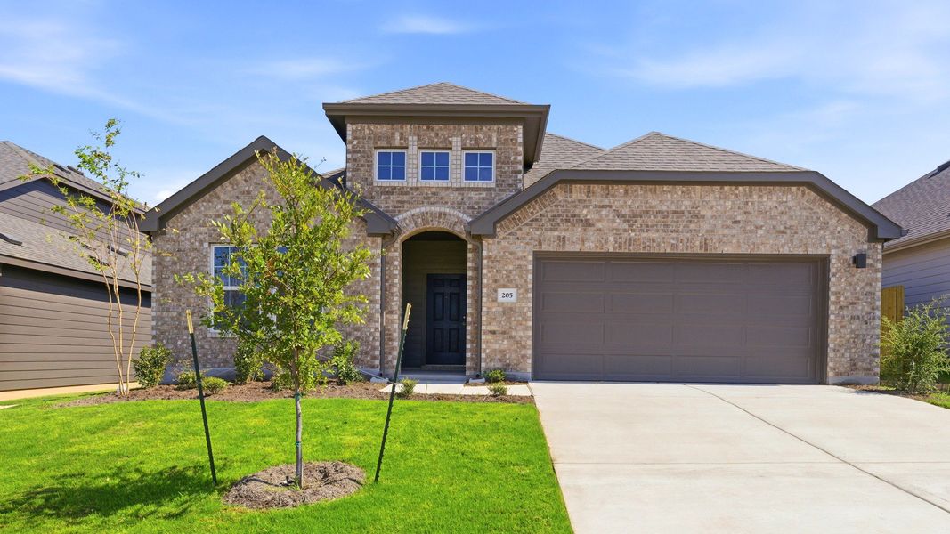 Front exterior of a new home in Hunters Glen, Jarrell, TX, highlighting curb appeal (Image 21). Front exterior of a new home in Hunters Glen, Jarrell, TX, highlighting curb appeal (Image 21).