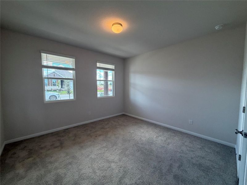 Spacious, unfurnished interior of a new home in Willow Springs, Buda (Image 18).