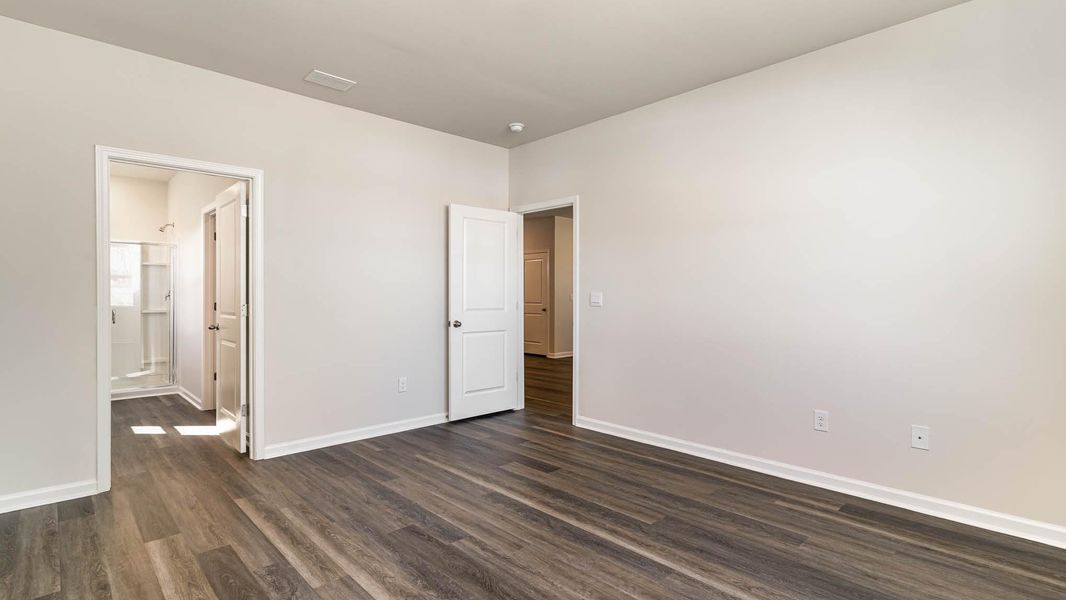 Representative unfurnished interior of a home built from the KERRY by D.R. Horton in Sandridge Park, Little River (Image 17).