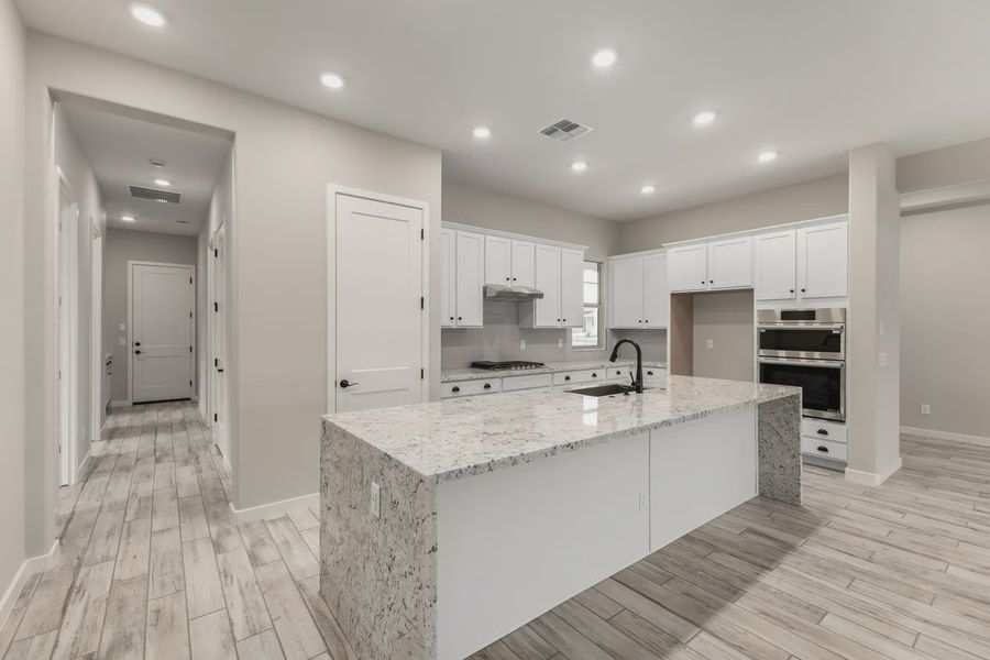 Furnished interior view inside a new home in Valencia at Granite Vista, Waddell (Image 8).
