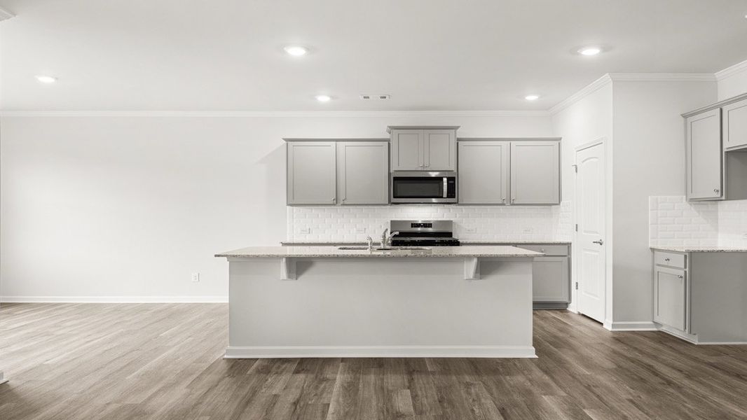Representative furnished interior of a home built from the Booth by D.R. Horton in Liberty Crossing, Braselton (Image 6).