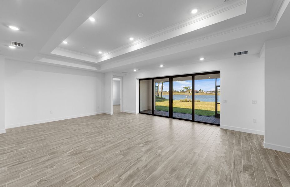 Spacious, unfurnished interior of a new home in Del Webb Naples, Ave Maria (Image 14).