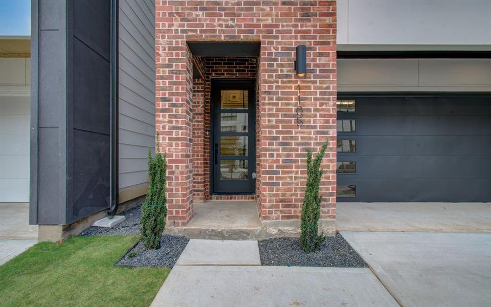 Modern Industrial Architecture at its finest with red brick accents to pay tribute to EaDo's History and red brick warehouses