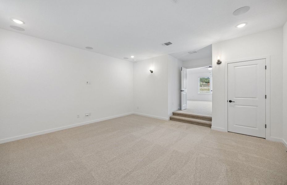 Representative unfurnished interior of a home built from the Wheeler by Pulte Homes in West Cypress Hills, Spicewood (Image 32).