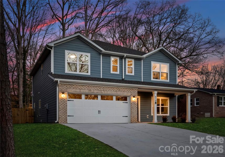 Front exterior of a new home in , Charlotte, NC, highlighting curb appeal (Image 2). Front exterior of a new home in , Charlotte, NC, highlighting curb appeal (Image 2).