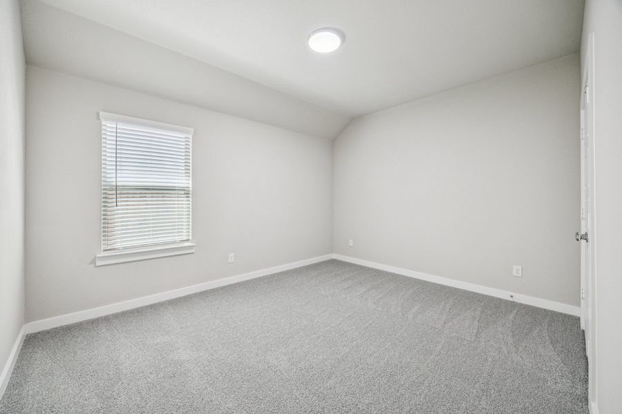 Bedroom in the Oscar home plan by Trophy Signature Homes – REPRESENTATIVE PHOTO Bedroom in the Oscar home plan by Trophy Signature Homes – REPRESENTATIVE PHOTO