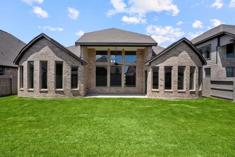 Front exterior of a new home in Pomona 60', Manvel, TX, highlighting curb appeal (Image 24). Front exterior of a new home in Pomona 60', Manvel, TX, highlighting curb appeal (Image 24).