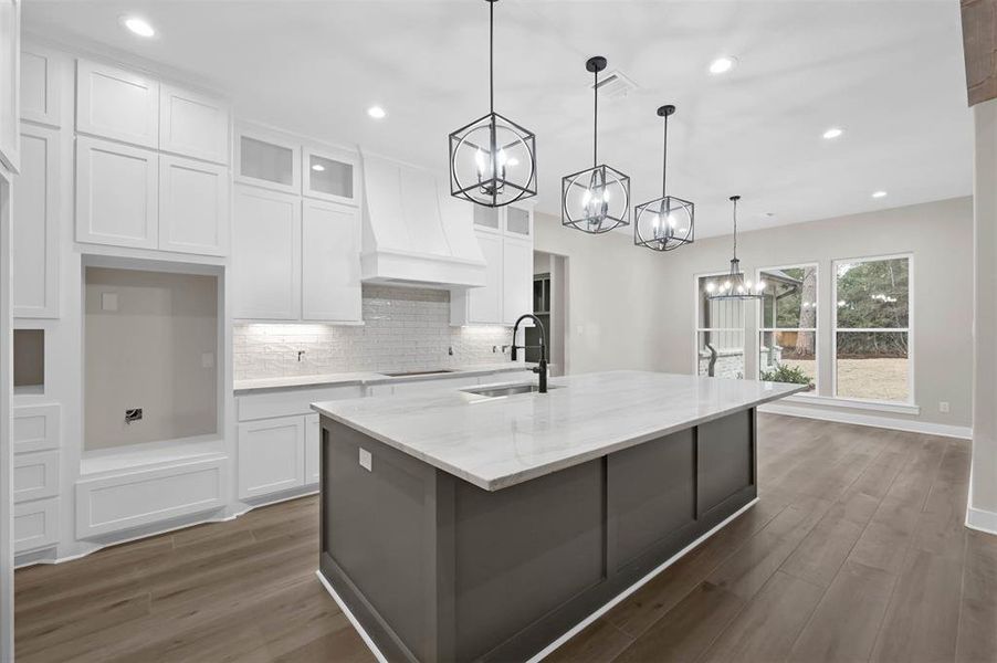 Kitchen and breakfast nook view.  Double ovens for entertaining or family gatherings.