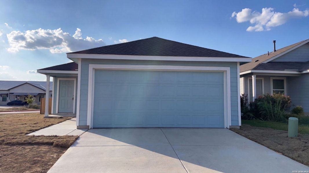 Front exterior of a new home in Landon Ridge, San Antonio, TX, highlighting curb appeal (Image 20).