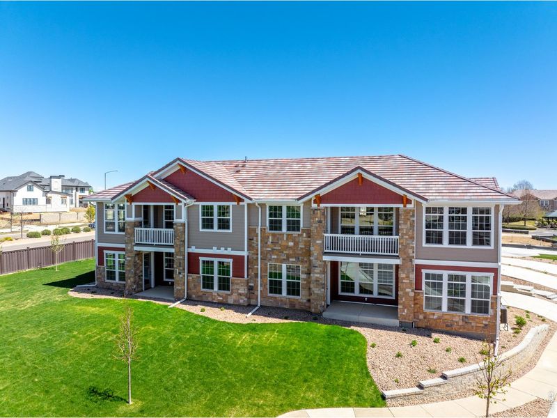 Front exterior of a new home in , Broomfield, CO, highlighting curb appeal (Image 23).
