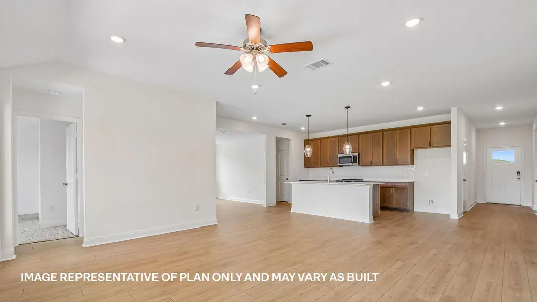 Furnished interior view inside a new home in Monarch Ranch, Manor (Image 3).