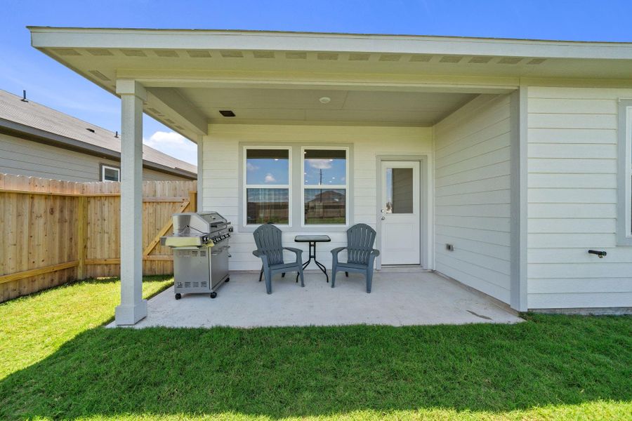 Exterior details and patio area of a home in Redbud, Hockley (Image 21).