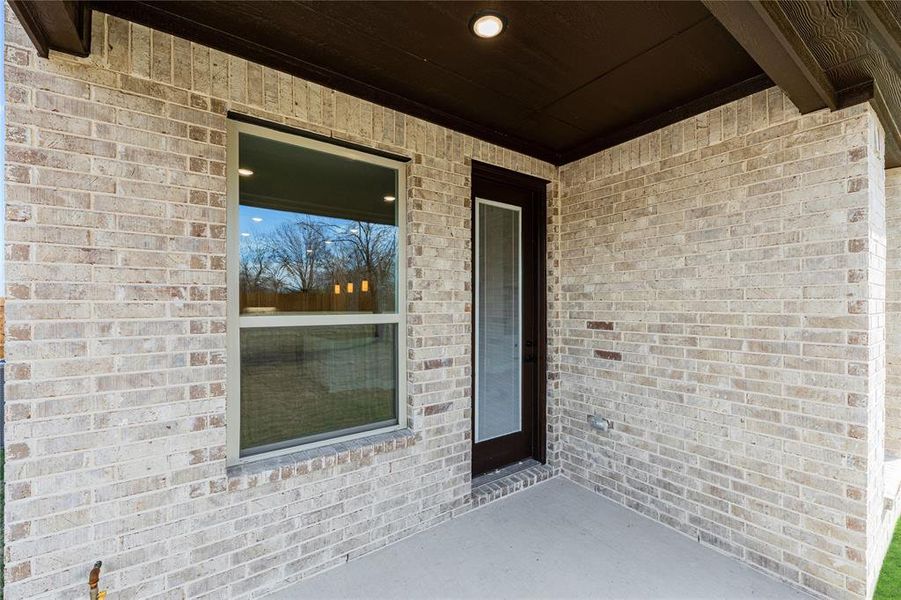 Exterior details and patio area of a home in Crystal Lake Estates, Red Oak (Image 19).