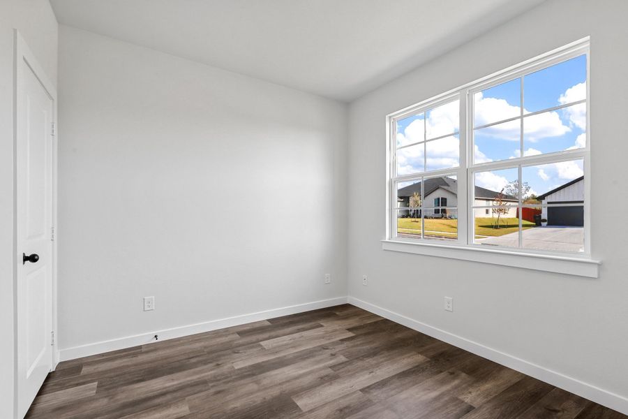 Representative unfurnished interior of a home built from the Garrison II by Cheldan Homes in Stoneview, Glen Rose (Image 22).