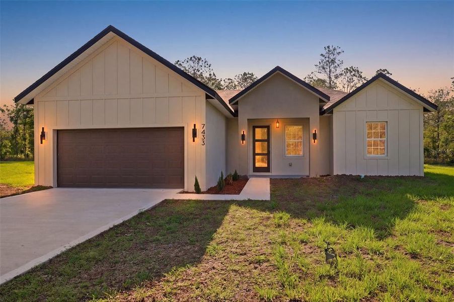 Front exterior of a new home in , Dunnellon, FL, highlighting curb appeal (Image 1). Front exterior of a new home in , Dunnellon, FL, highlighting curb appeal (Image 1).