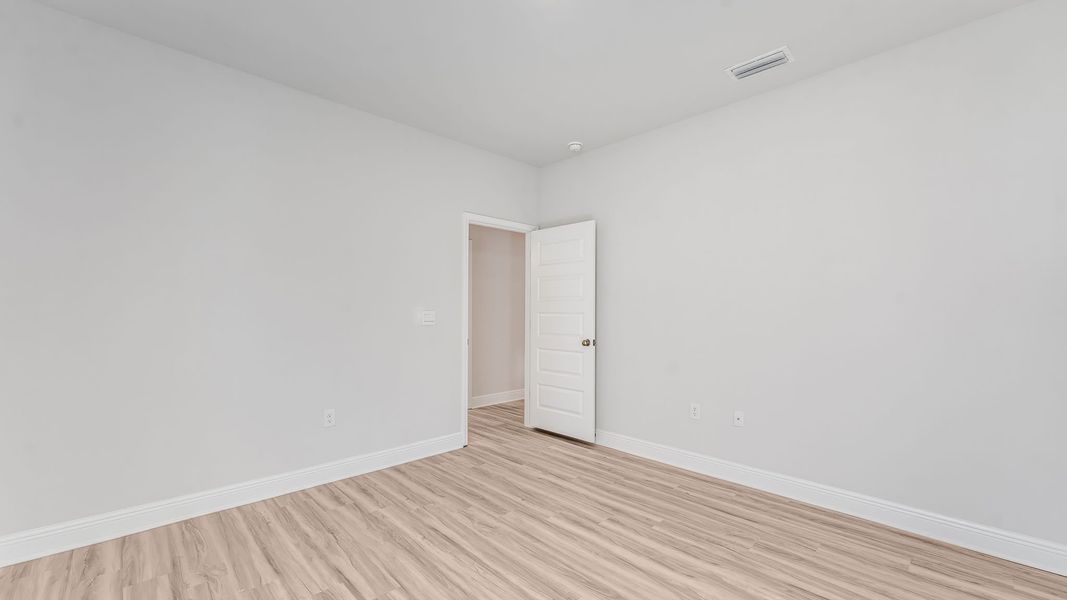 Spacious, unfurnished interior of a new home in WindMark Beach, Port Saint Joe (Image 30).