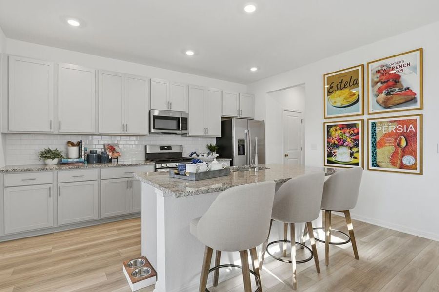 Representative furnished interior of a home built from the Hawk by Taylor Morrison in Longview 40s, Del Valle (Image 6).