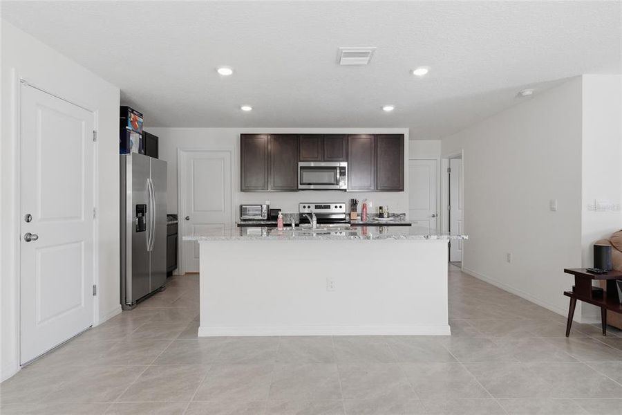Furnished interior view inside a new home in Avalon Woods, Newberry (Image 5).