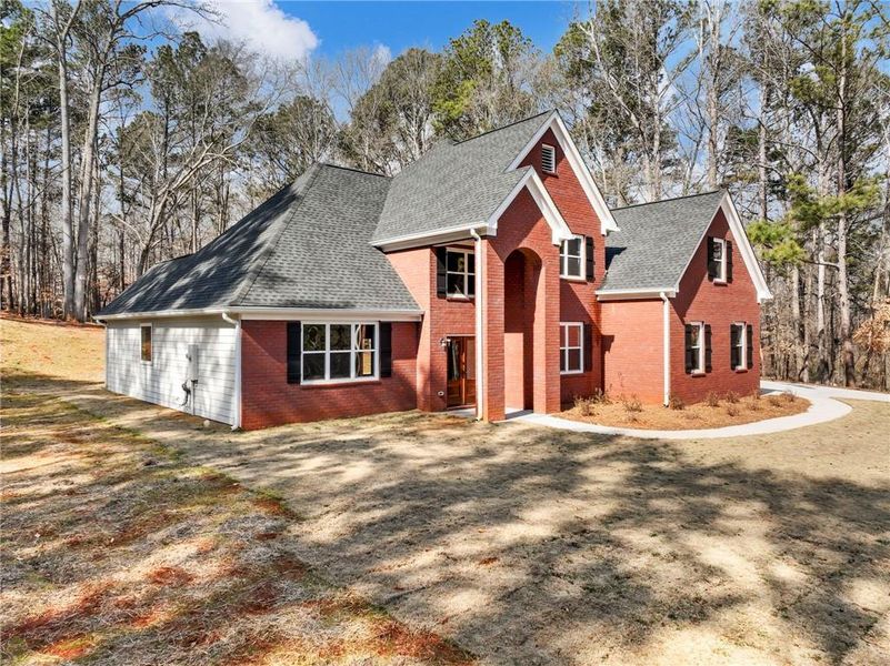 Front exterior of a new home in , Winder, GA, highlighting curb appeal (Image 23).