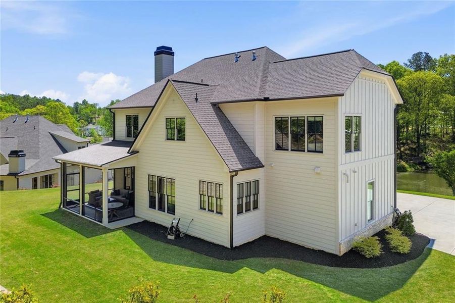 Exterior details and patio area of a home in Malone's Pond, Ball Ground (Image 3).