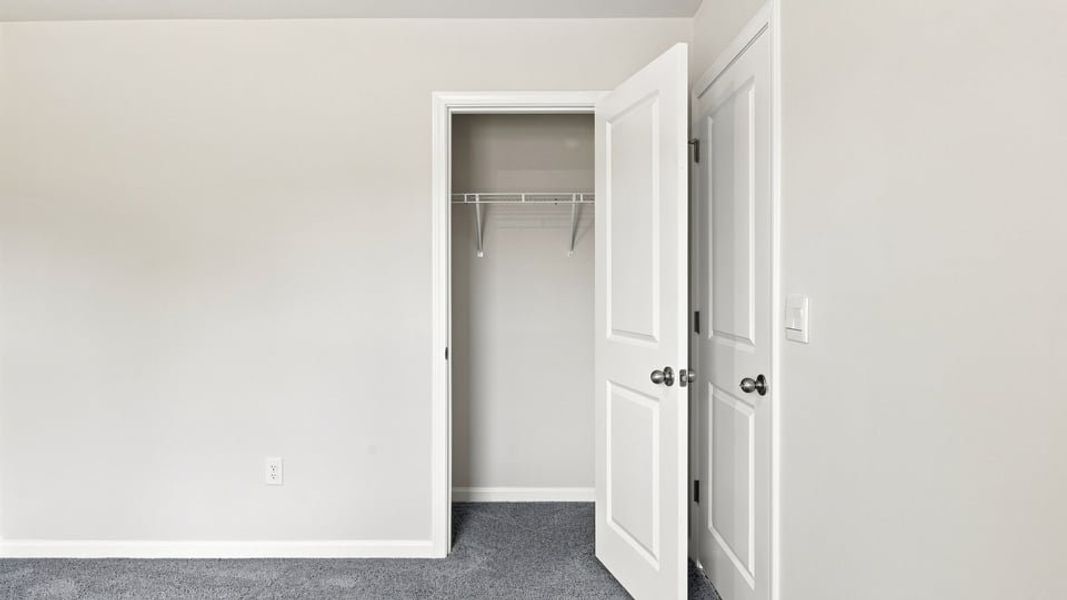 Spacious, unfurnished interior of a new home in Village 3, Woodruff (Image 30).