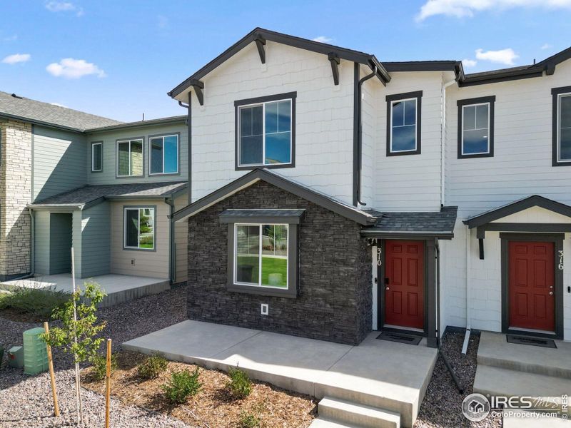 Exterior details and patio area of a home in Pintail Commons at Johnstown Village, Johnstown (Image 1).