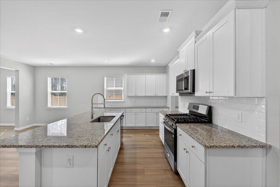 Furnished interior view inside a new home in Sweetgrass at Summers Corner, Summerville (Image 6).
