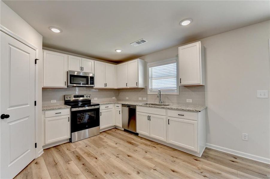 Furnished interior view inside a new home in , Auburn (Image 7). Furnished interior view inside a new home in , Auburn (Image 7).