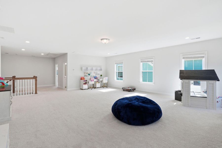 Furnished interior view inside a new home in Tidewater at Lakes of Cane Bay, Summerville (Image 13).