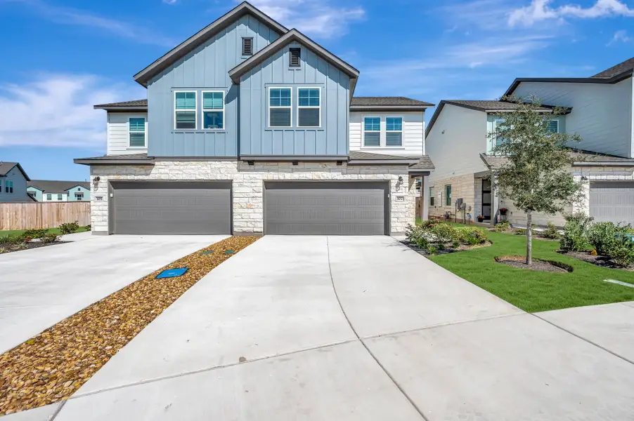 Front exterior of a new home in Park Central, Georgetown, TX, highlighting curb appeal (Image 2). Front exterior of a new home in Park Central, Georgetown, TX, highlighting curb appeal (Image 2).
