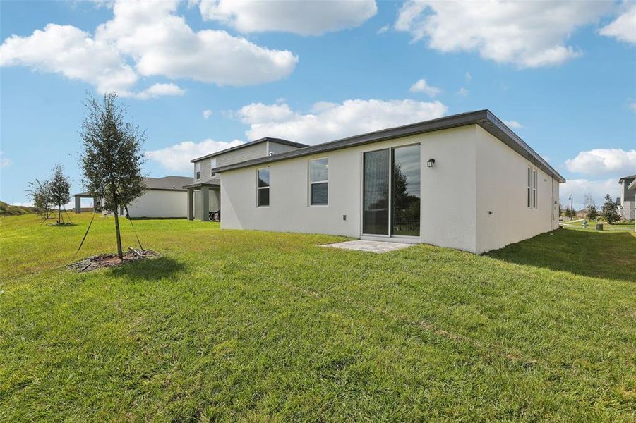 Exterior details and patio area of a home in Crosswinds - Signature Series, Haines City (Image 4).