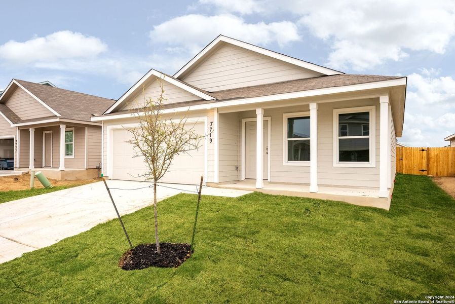 Front exterior of a new home in Torian Village, San Antonio, TX, highlighting curb appeal (Image 2). Front exterior of a new home in Torian Village, San Antonio, TX, highlighting curb appeal (Image 2).