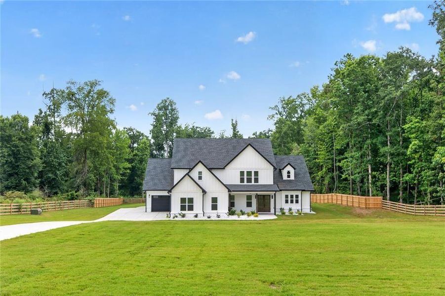 Front exterior of a new home in , Bethlehem, GA, highlighting curb appeal (Image 30).