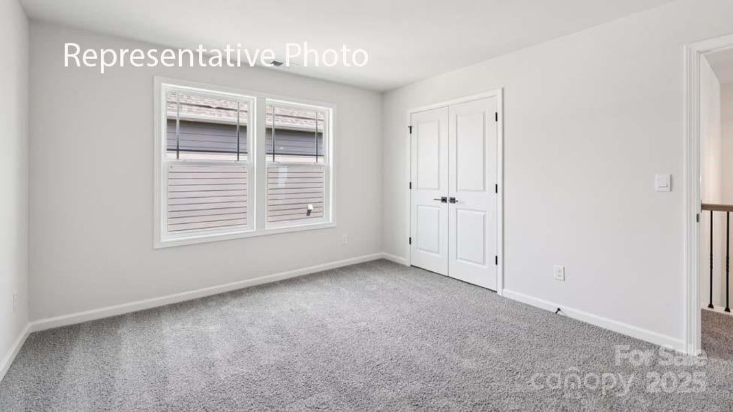 Spacious, unfurnished interior of a new home in Sanctuary at Southgate, Indian Trail (Image 28).